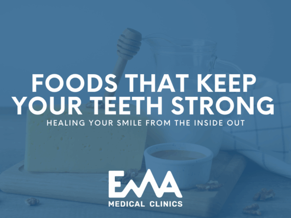 A block of cheese, a jar of honey with a dipper, a cup of milk, and scattered walnuts on a wooden board, promoting healthy foods that strengthen teeth. Text overlay reads: 'Foods That Keep Your Teeth Strong – Healing Your Smile From the Inside Out' by EMA Medical Clinics.